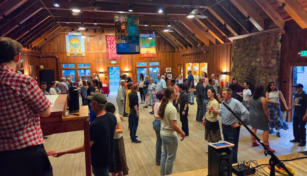 Harrison Keely calls a contra dance at the John C. Campbell Folk School